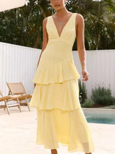 Sleeveless ruffled layered backless maxi dress in polyester with tied details and no stretch