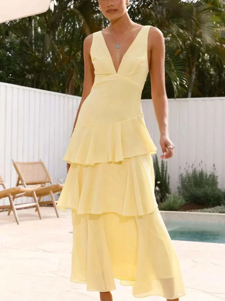 Sleeveless ruffled layered backless maxi dress in polyester with tied details and no stretch