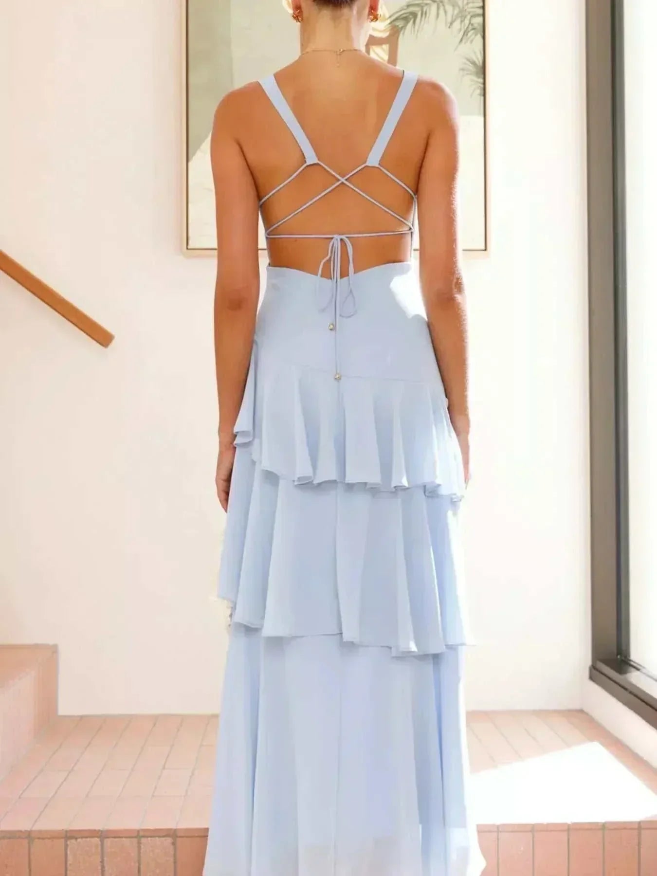Sleeveless ruffled layered backless maxi dress in polyester with tied details and no stretch