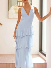 Sleeveless ruffled layered backless maxi dress in polyester with tied detail and no stretch