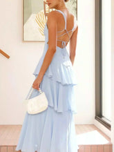 Sleeveless ruffled layered backless maxi dress in polyester with tied details and no stretch