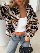 Geometric fleece zip-up jacket with zipper in 100% polyester, normal thickness, unlined body, available in multiple sizes