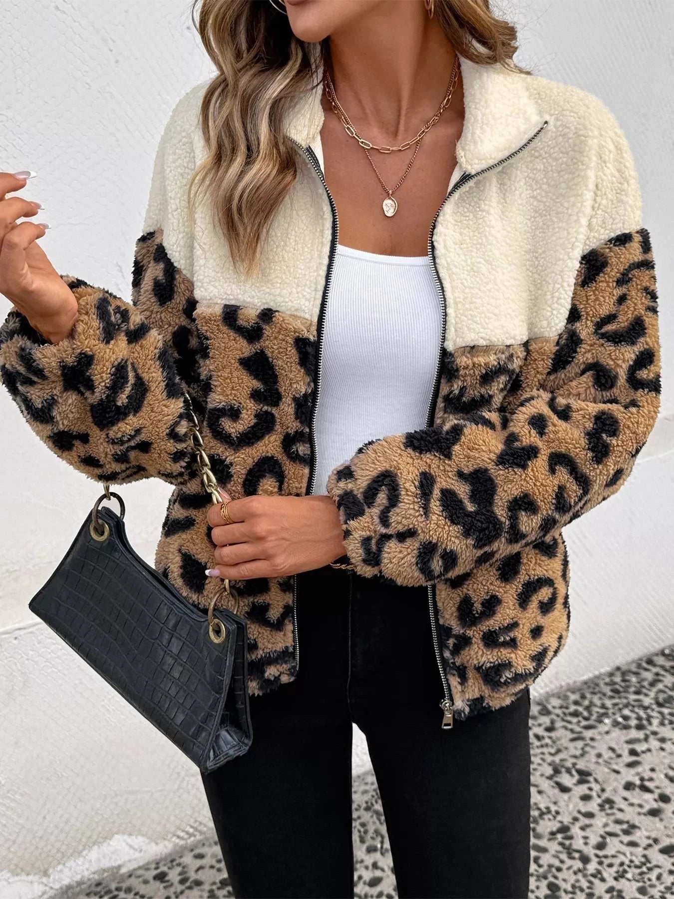 Leopard zip up fleece jacket with pockets and zipper closure in 100% polyester