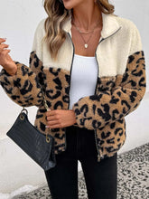 Leopard zip up fleece jacket with pockets and zipper closure in 100% polyester