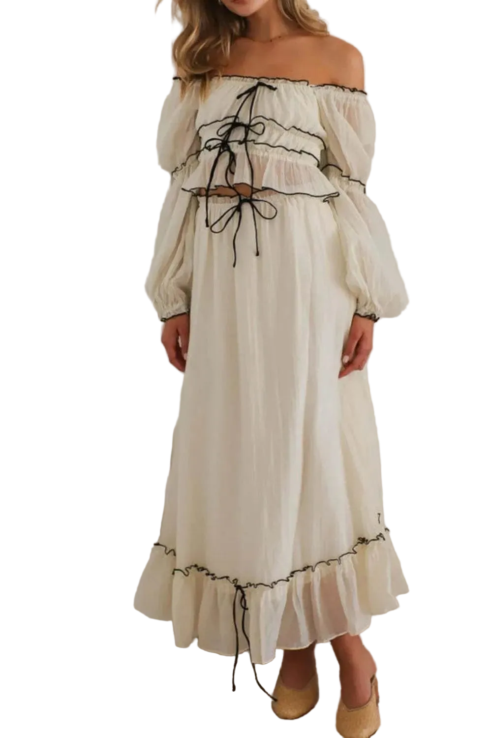 Women wearing a ruffled off-shoulder top and skirt set with tied and ruched details
