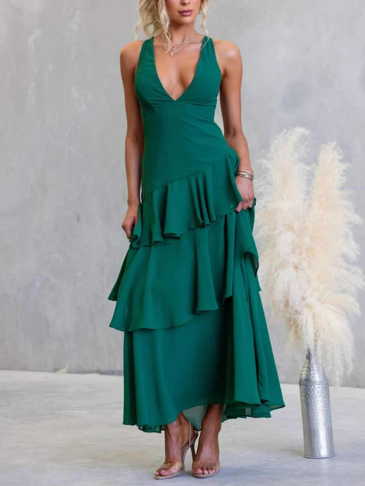 Sleeveless ruffled layered backless maxi dress made of 100% polyester with tied details