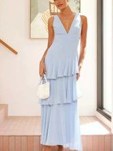 Sleeveless ruffled layered backless maxi dress in polyester with tied detail