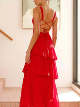 Sleeveless ruffled layered backless maxi dress with tied detail in polyester fabric