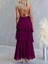 Sleeveless ruffled layered backless maxi dress with tied straps in polyester fabric