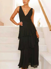 Sleeveless ruffled layered backless maxi dress with tied detail in polyester fabric