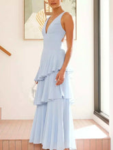 Sleeveless ruffled layered backless maxi dress in polyester, machine washable, with tied detailing