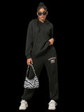 Two-piece graphic hoodie and sweatpants set in basic style, slightly stretchy polyester fabric