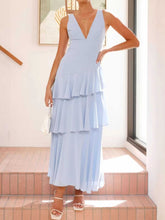 Sleeveless ruffled layered backless maxi dress with tie detail in polyester fabric