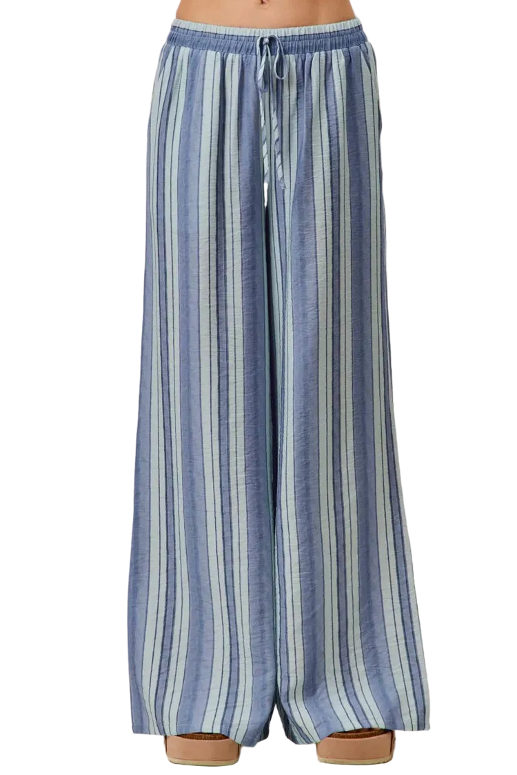 Women wearing SO ME stripe wide leg pull on pants with elastic waist and pockets