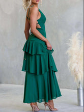 Sleeveless ruffled layered backless maxi dress with tied straps and no stretch polyester fabric