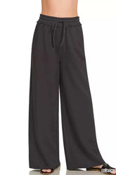 Woman wearing Zenana French Terry wide leg sweatpants in casual relaxed outfit