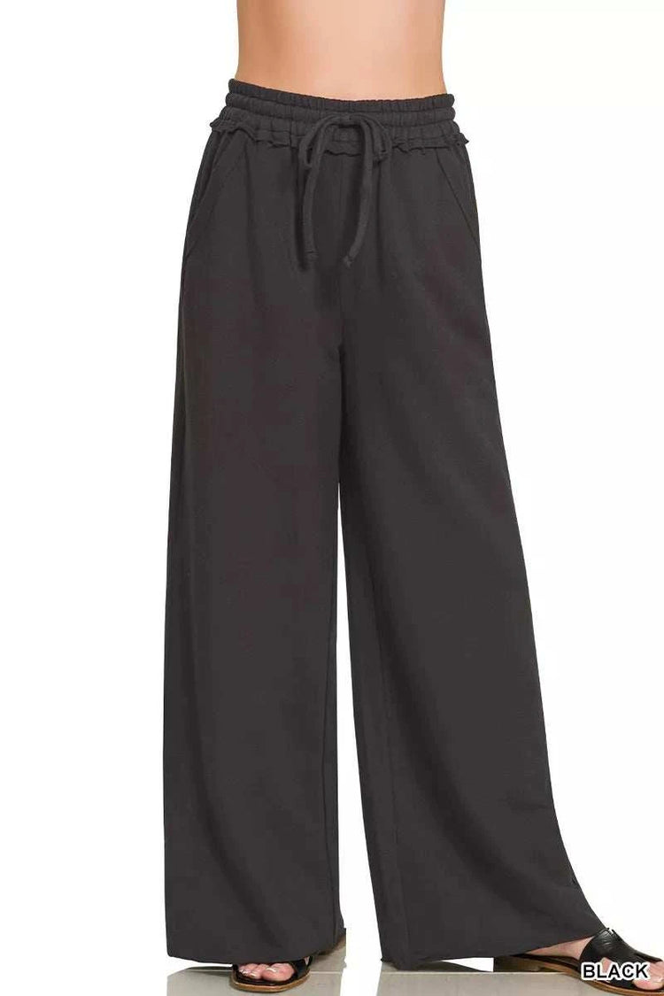 Woman wearing Zenana French Terry wide leg sweatpants in casual relaxed outfit