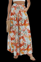 Tied wide leg pants with pockets made of opaque polyester and spandex blend