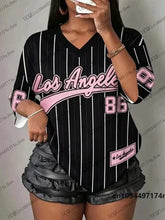 Women wearing oversized V-neck striped Los Angeles No.86 print sports tee