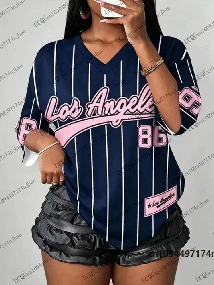 Women wearing oversized V-neck striped t shirt with Los Angeles No.86 print